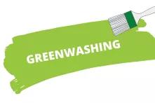 Ein Pinsel streicht mit grüner Farbe über den weißen Hintergrund. Auf der grünen Farbe steht "greenwashing"